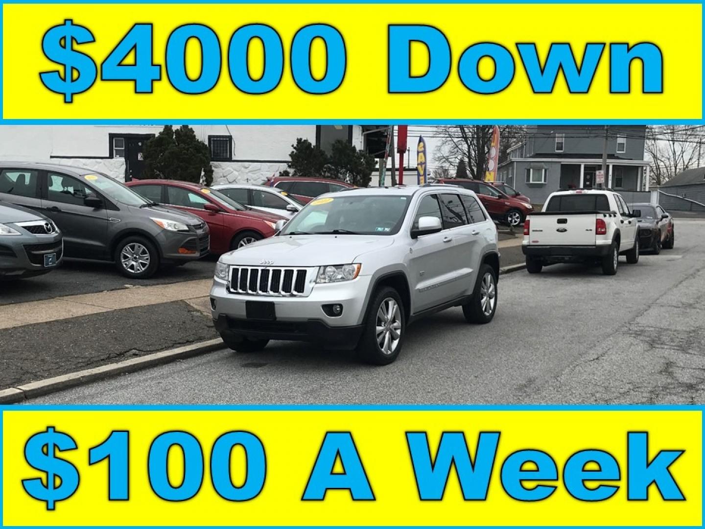 2011 Silver /Black Jeep Grand Cherokee Laredo (1J4RR4GTXBC) with an 5.7 Liter HEMI engine, Automatic transmission, located at 577 Chester Pike, Prospect Park, PA, 19076, (610) 237-1015, 39.886154, -75.302338 - Photo#0